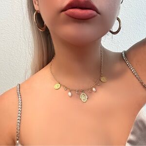 Virgin Mary st Benedict pearl necklace